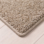 Aurelis Teppich nach Maß | Farbe: Sand (072) | gekettelte Kante (Beispielbild, Farbe kann abweichen)