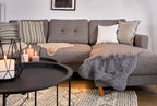 Fellara Dekofell, Grau, auf dem Sofa