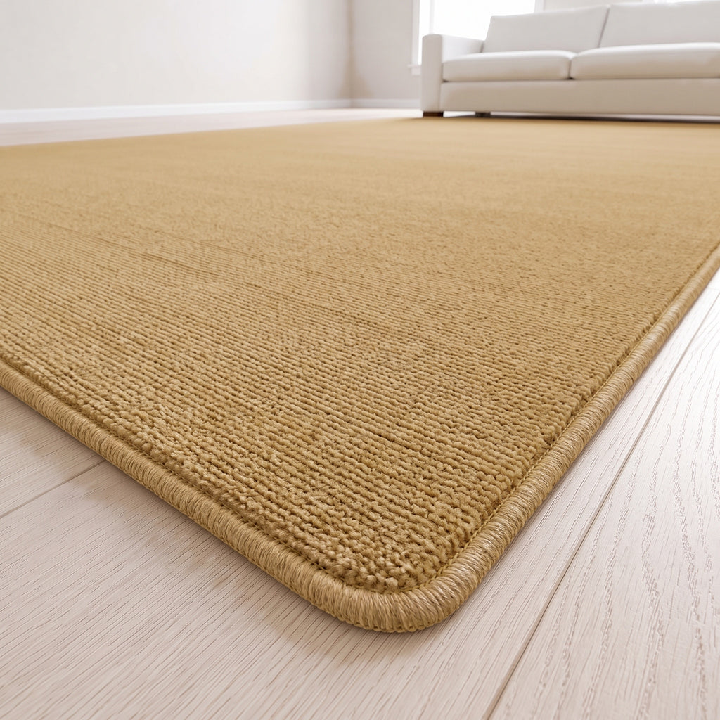 Isotta Teppich nach Maß | Farbe: Sand (033) | Kettelecke (Beispielbild, Farbe kann abweichen)