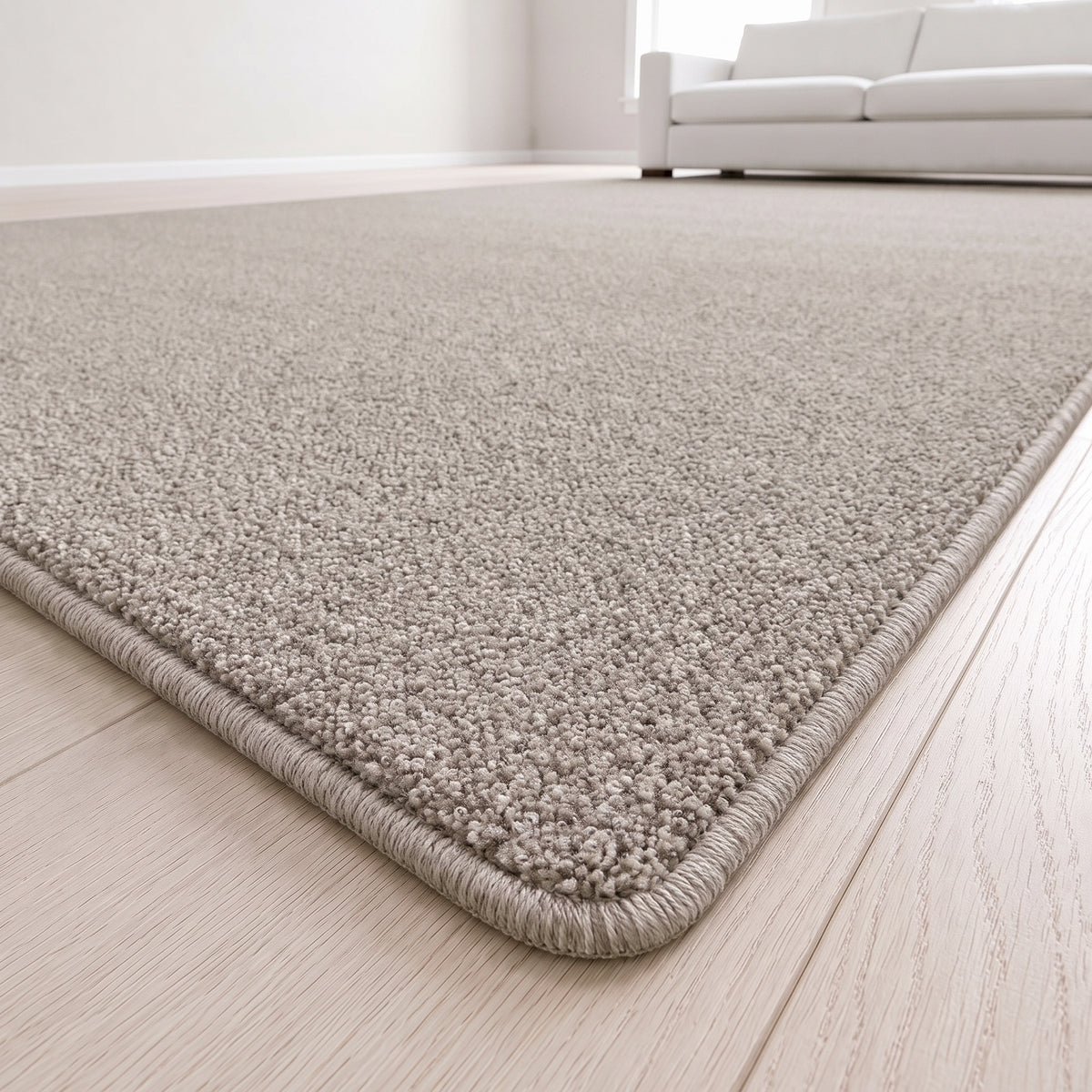 Quirina Teppich nach Maß | Farbe: Sand (075) | Kettelecke (Beispielbild, Farbe kann abweichen)