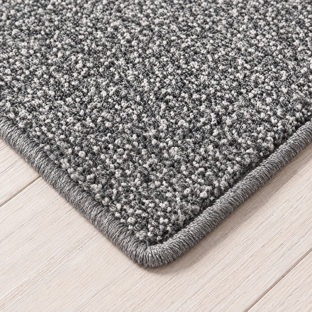 Verita Teppich nach Maß | Farbe: Grau Dunkel Warm | gekettelte Kante (Beispielbild, Farbe kann abweichen)