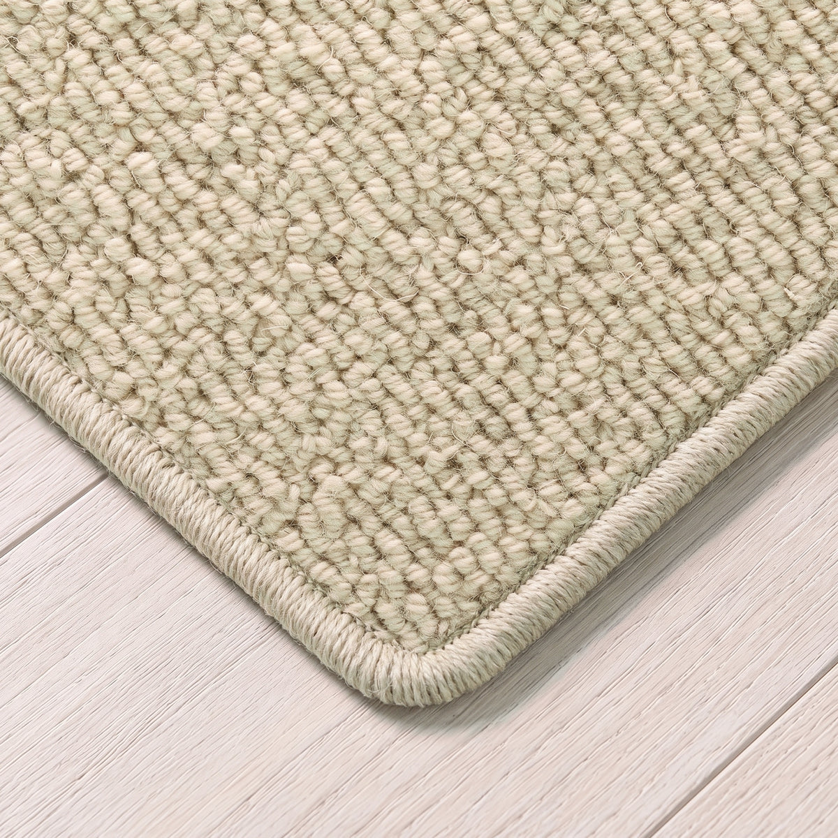 Woolara Teppich nach Maß | Farbe: Sand Hell | gekettelte Kante (Beispielbild, Farbe kann abweichen)